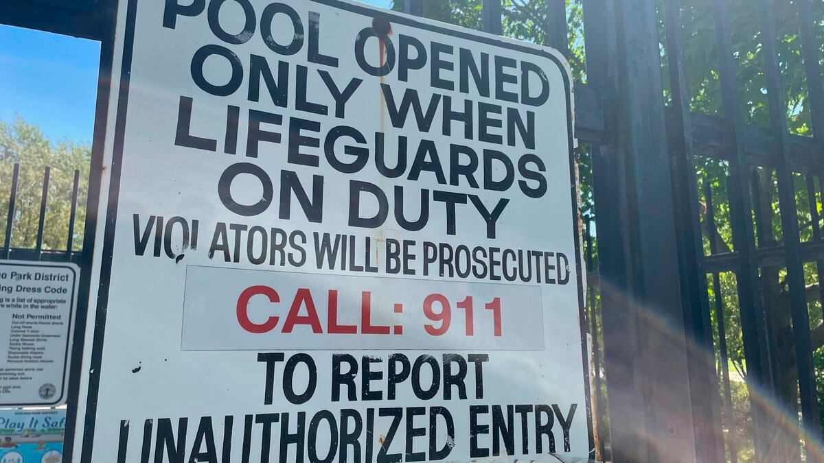 The empty pool at the Wrightwood Park Pool remains closed to swimmers in Chicago, Thursday,...