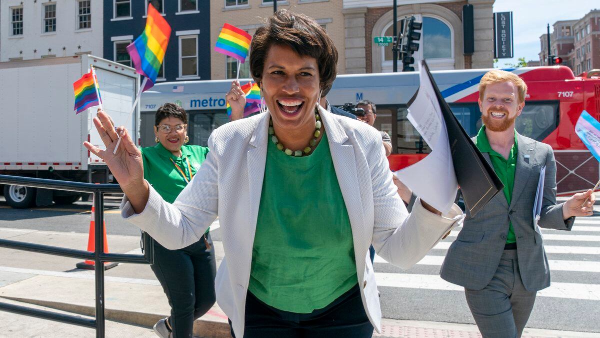 FILE - District of Columbia Mayor Muriel Bowser, center, arrives for a news conference ahead of...
