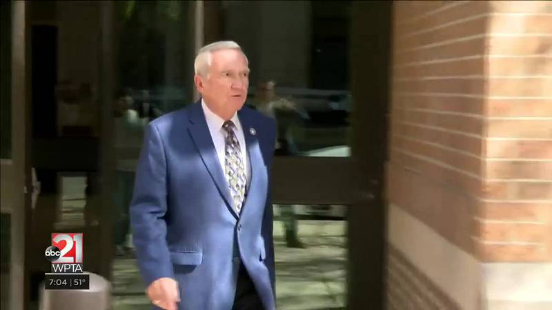 Mayor Tom Henry leaving a court hearing after pleading guilty to OWI.
