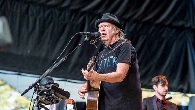 Neil Young performs at the 30th Annual Bridge School Benefit Concert at the Shoreline...
