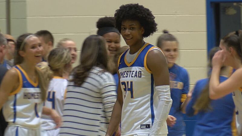 Homestead Spartans Ayanna Patterson celebrates another win.