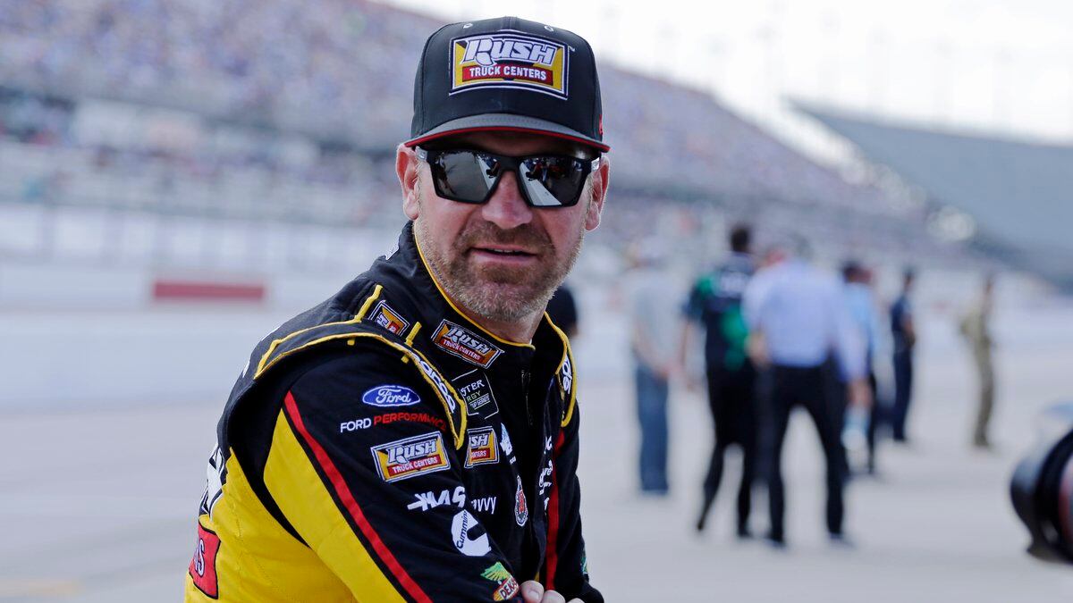 FILE - In this Aug. 31, 2019, file photo, Clint Bowyer waits on pit road for his turn to...