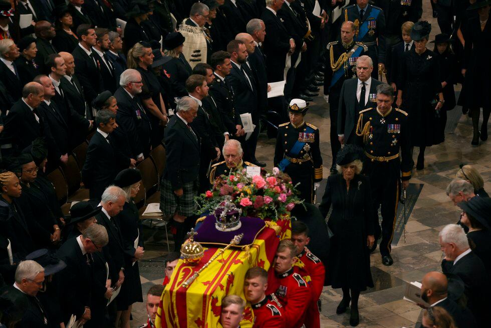King Charles III, Camilla, Queen Consort and other members of the Royal family follow the...