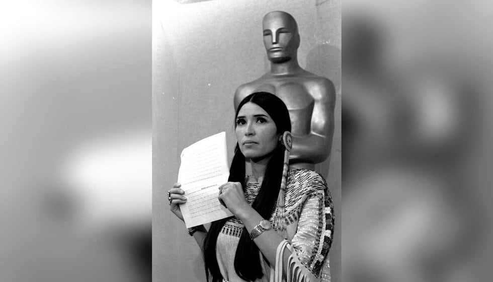 FILE - Sacheen Littlefeather appears at the Academy Awards ceremony to announce that Marlon...