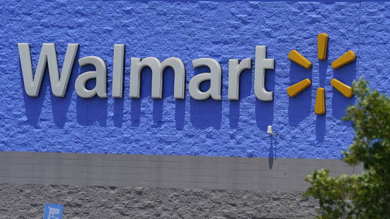 A sign at a Walmart store is pictured Thursday, June 24, 2021, in Oklahoma City. (AP Photo/Sue...