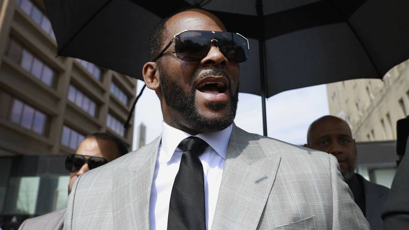 FILE - Musician R. Kelly leaves the Leighton Criminal Court building in Chicago on June 6,...