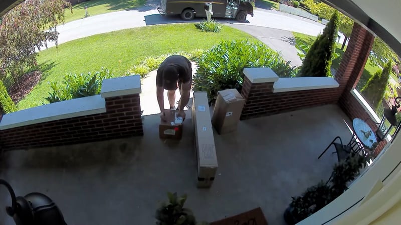 A doorbell camera in Middletown captured a FedEx delivery driver writing something on a box.