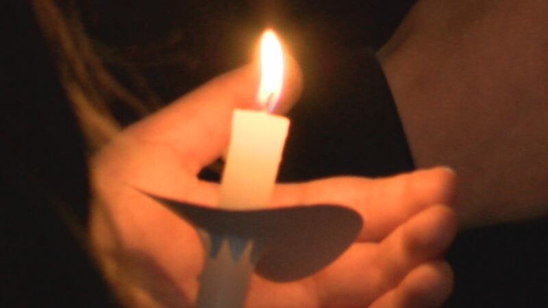 The candlelit vigil for 15-year-old Eric McDonnell was held at the Allen County Jail Sunday...