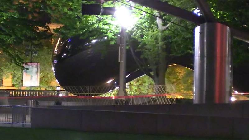 The "Bean" sculpture at Millennium Park in Chicago is shown cordoned off after Saturday's...