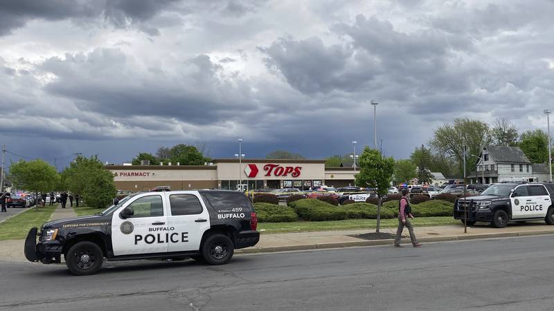 Buffalo Police respond to a shooting at Tops Friendly Market in Buffalo, N.Y., Saturday, May...