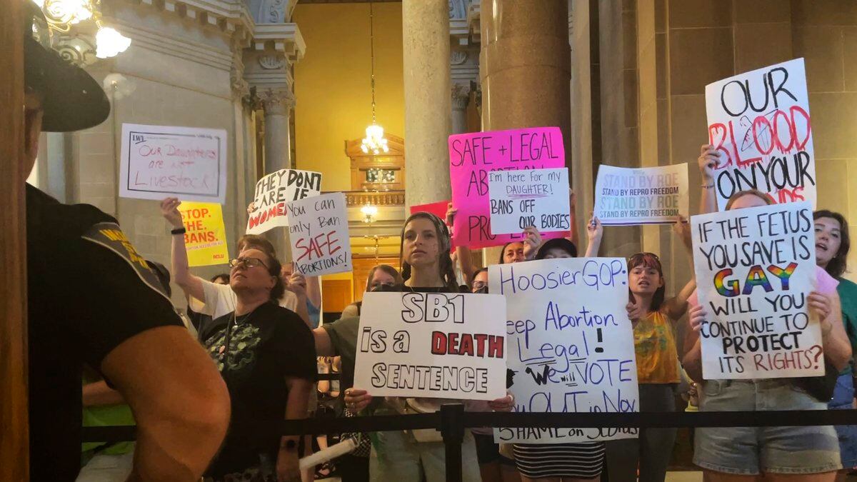 Abortion-rights protesters fill Indiana Statehouse corridors and cheer outside legislative...