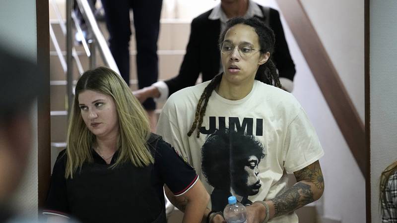 WNBA star and two-time Olympic gold medalist Brittney Griner is escorted to a courtroom for a...