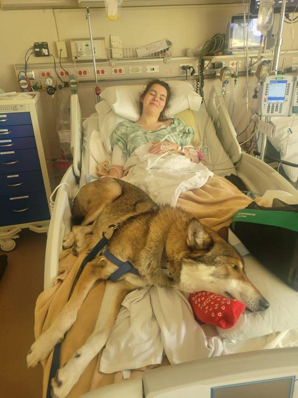Amelia Dean with the dog she was walking in Custer State Park when she was attacked by a bison.