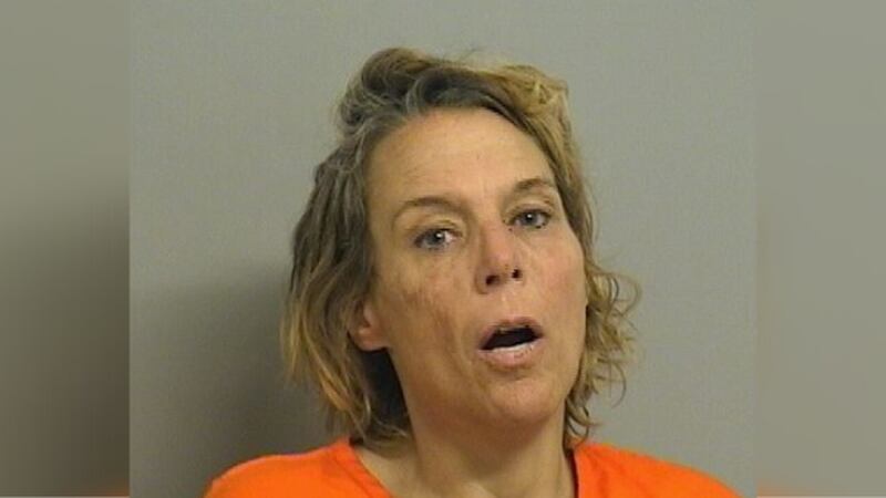 Tulsa police said they arrested a woman for attacking a pickup truck and then stripping naked...