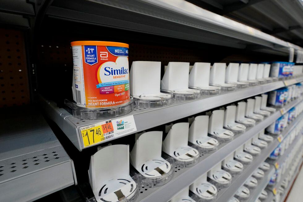 Shelves typically stocked with baby formula sit mostly empty at a store in San Antonio,...