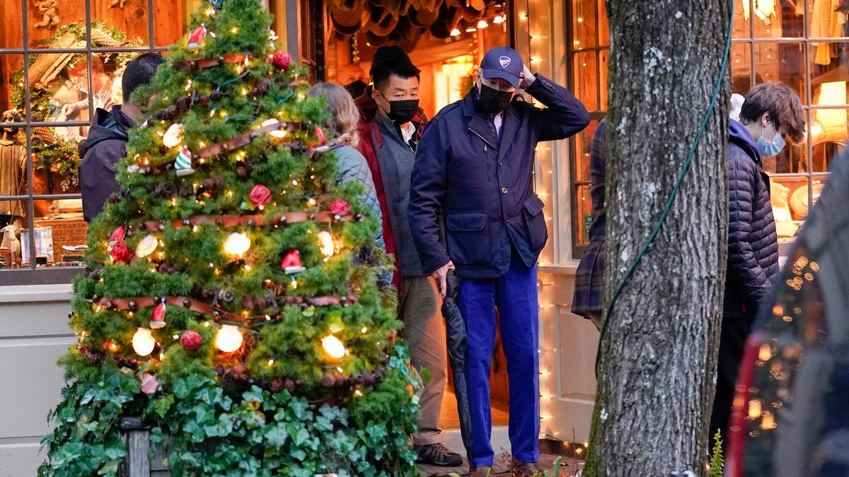 President Joe Biden walks out of a shop as he visits Nantucket, Mass., with family Friday, Nov....