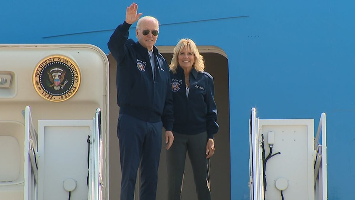 President Joe Biden and first lady Jill Biden  board Air Force One as they head to London for...