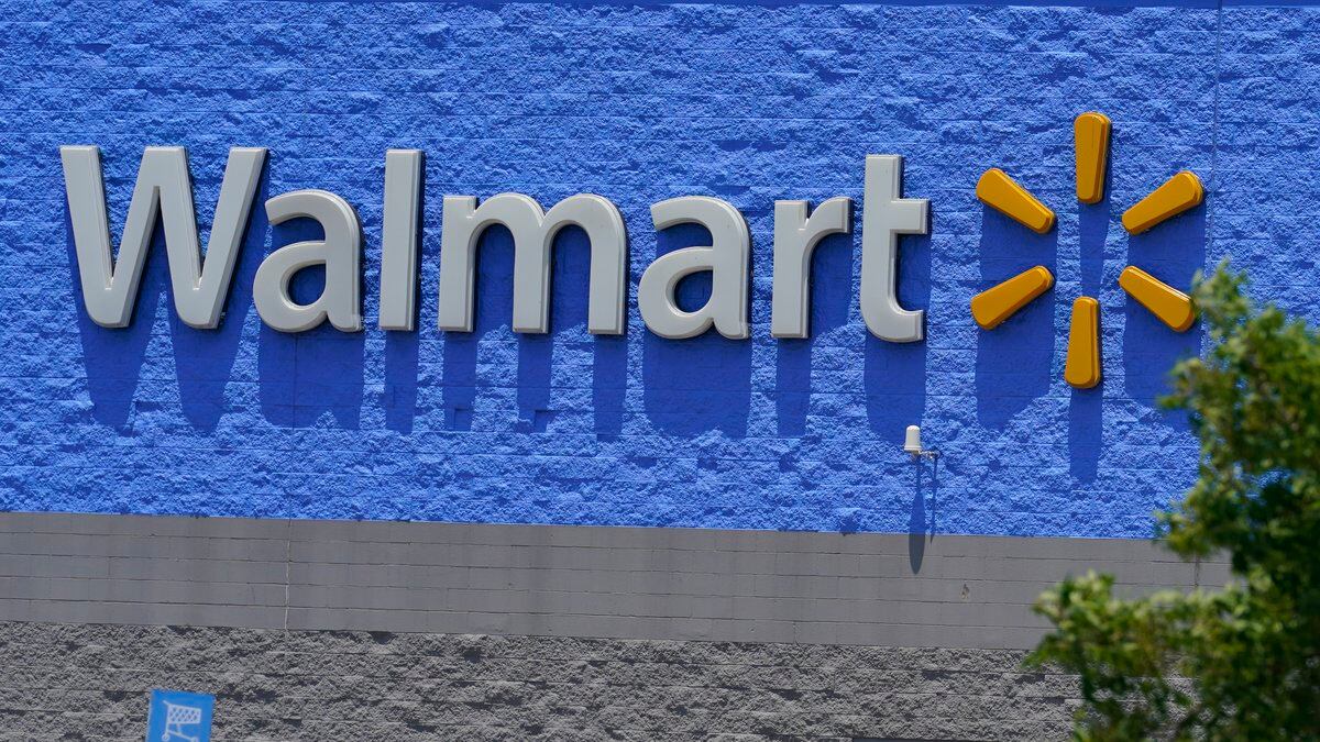 A sign at a Walmart store is pictured Thursday, June 24, 2021, in Oklahoma City. (AP Photo/Sue...