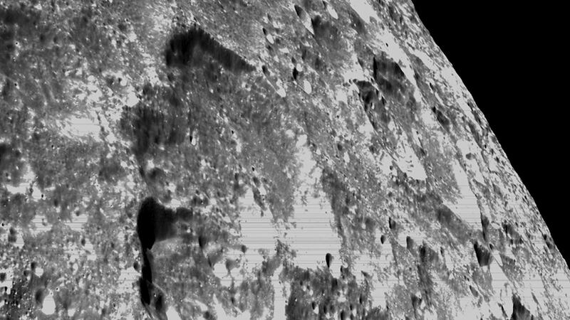 NASA released pictures of the moon taken by the Orion capsule during its closest approach to...