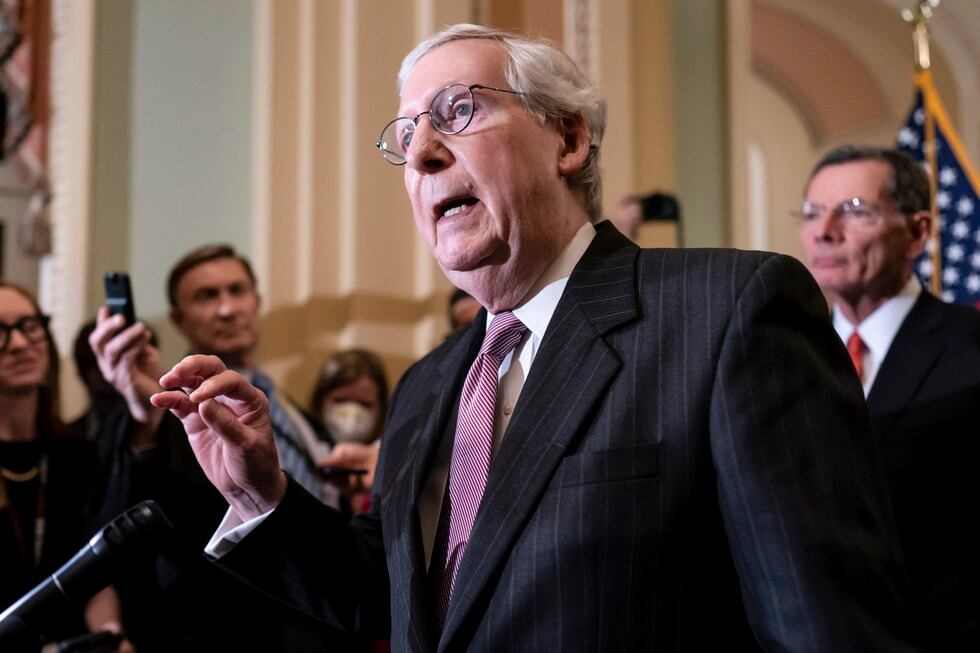 Senate Minority Leader Mitch McConnell, R-Ky., speaks to reporters ahead of a procedural vote...