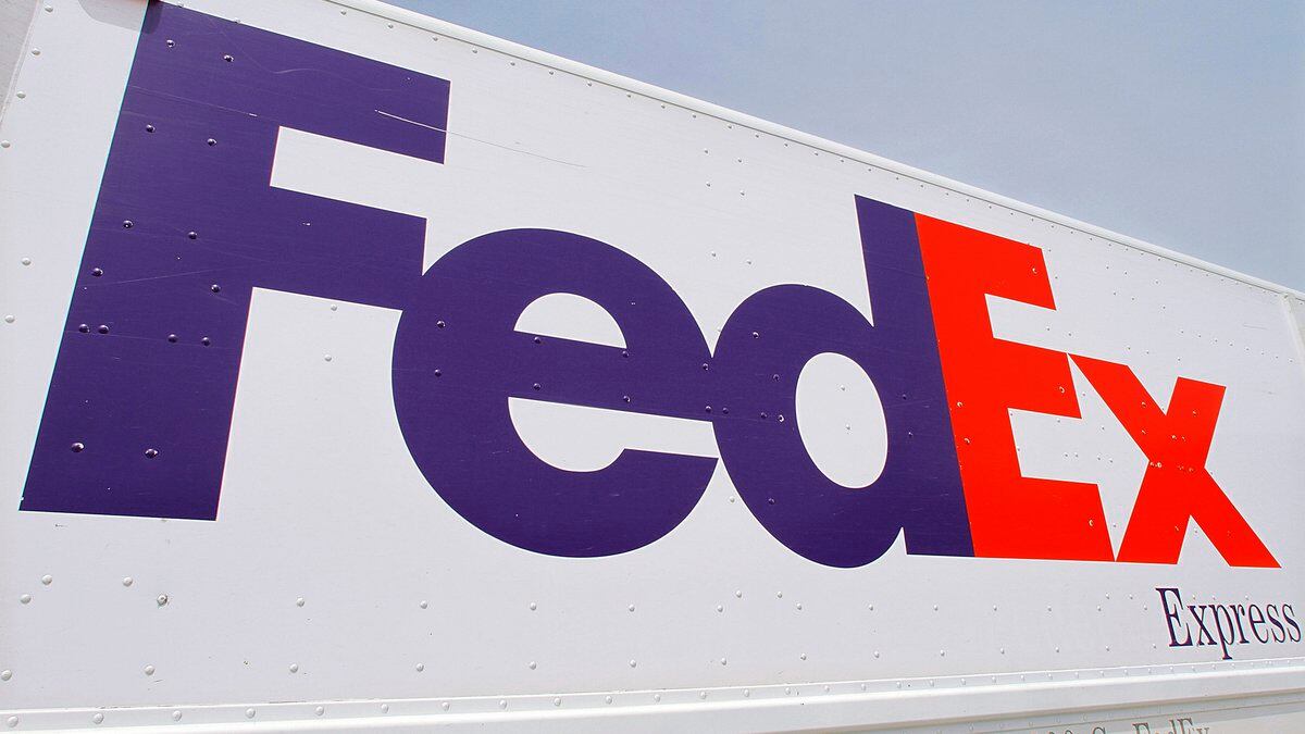 FILE - The FedEx logo is seen on a delivery truck Tuesday, June 21, 2011, in Springfield, Ill....