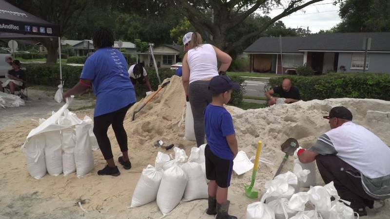 Residents in Tampa, Florida, lined up for sandbags Sunday, Sept. 25, 2022, as they prepared for...