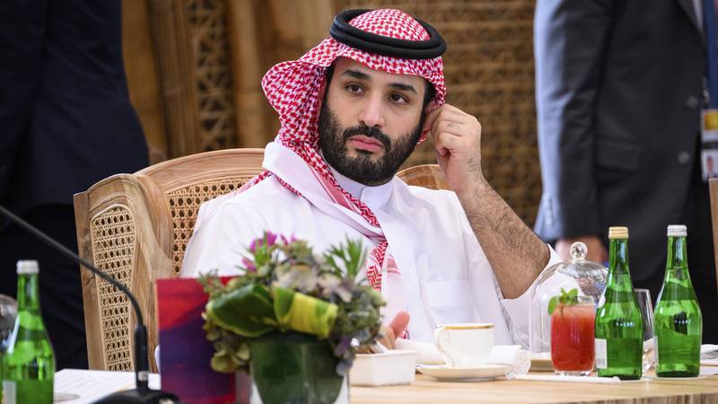 Crown Prince Mohammed bin Salman of Saudi Arabia takes his seat ahead of a working lunch at the...