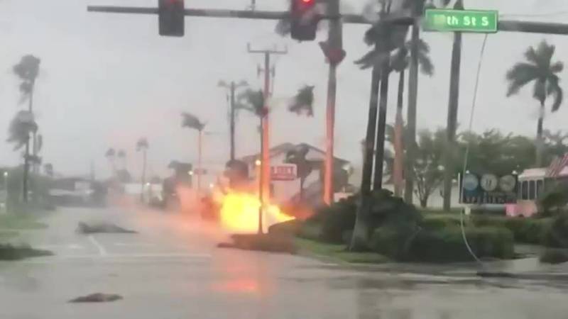 Hurricane Ian has unleashed destructive winds, leading to a downed power line in Naples on...