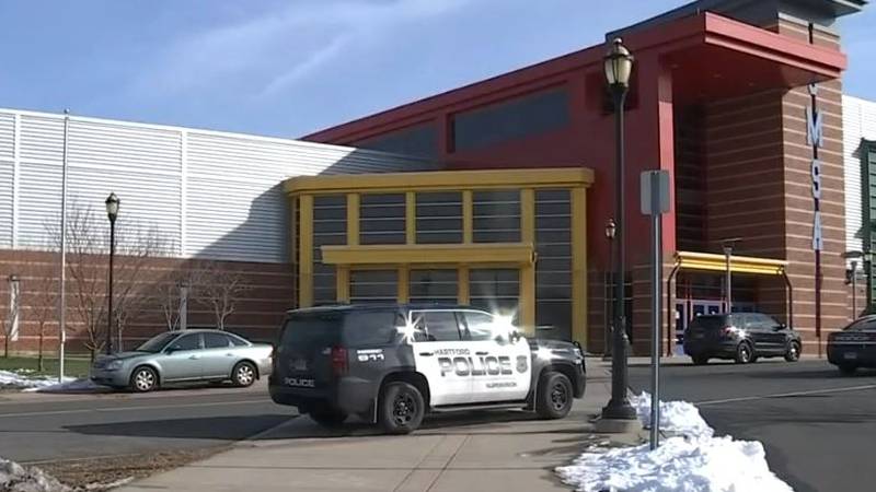 Police are seen outside Sports and Medical Sciences Academy in Hartford, Connecticut, after...