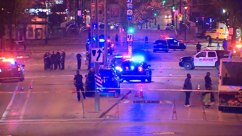 Authorities say about 20 people were injured in two shooting in downtown Milwaukee Friday night.
