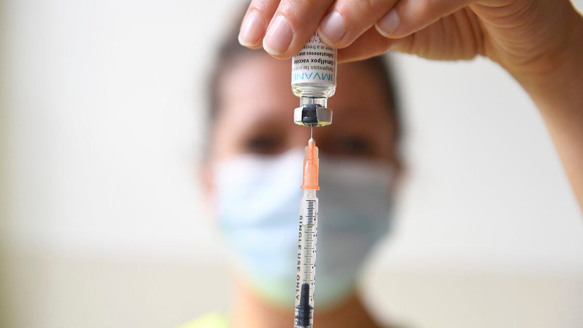 FILE - A health professional prepares a dose of a Monkeypox vaccine at the Edison municipal...