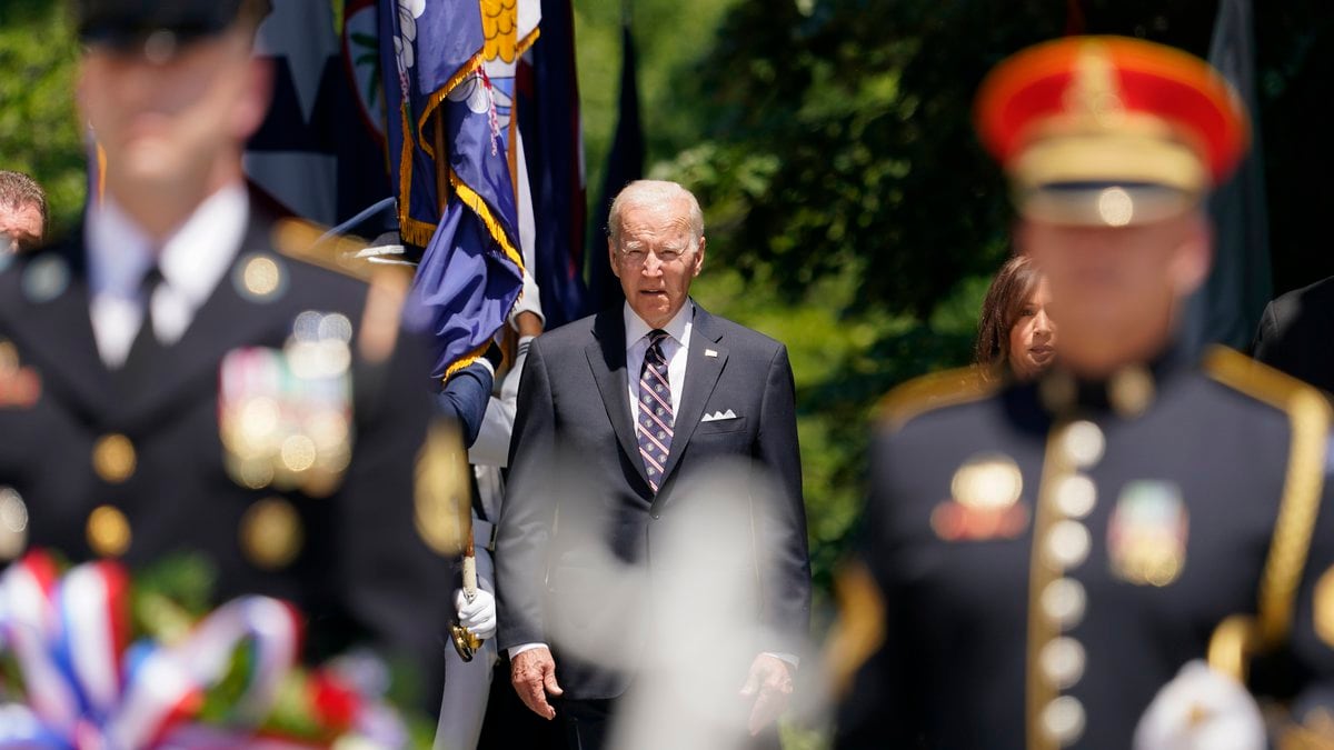 President Joe Biden arrives with Vice President Kamala Harris to lay a wreath at The Tomb of...