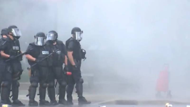 Police dispersed chemicals agents during clashes with protesters in downtown Fort Wayne in...