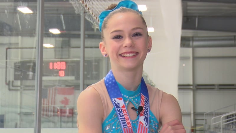 Churubusco figure skater Cayla Smith celebrates after winning a second place medal at the U.S....