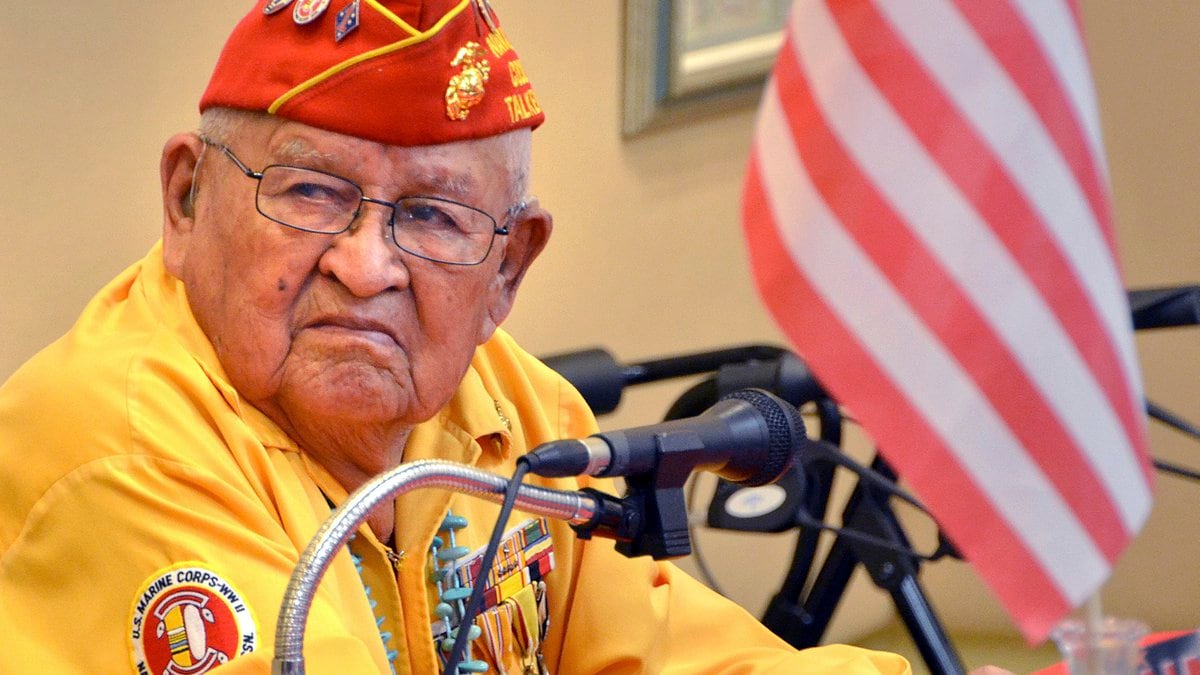 FILE - In this 2013 photo, Navajo Code Talker Samuel Sandoval talks about his experiences in...