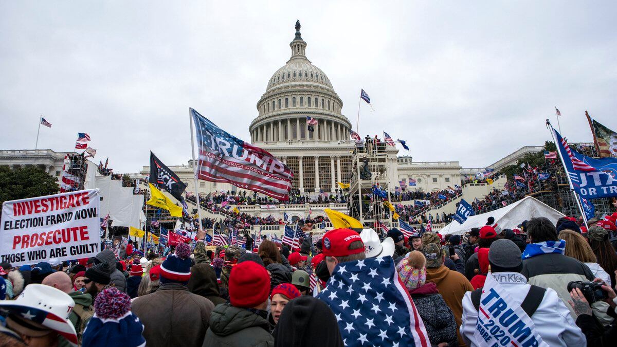 FILE - Rioters loyal to President Donald Trump rally at the U.S. Capitol in Washington on Jan....
