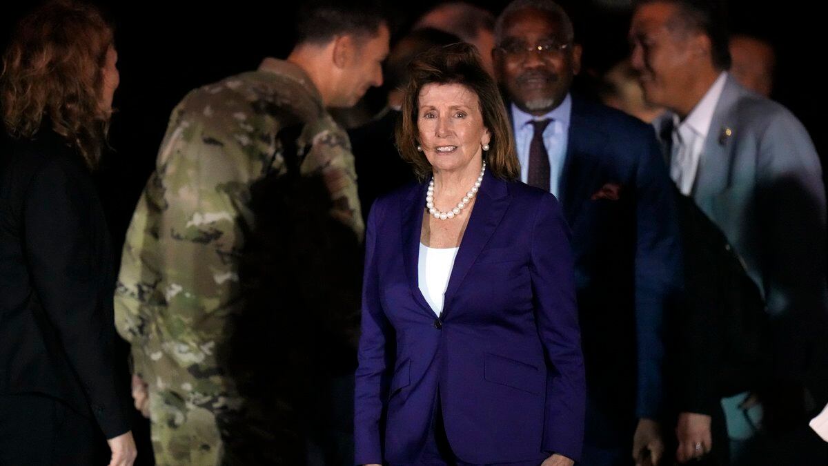 U.S. House Speaker Nancy Pelosi walks upon her arrival at the U.S. Yokota Air Base, in Fussa on...