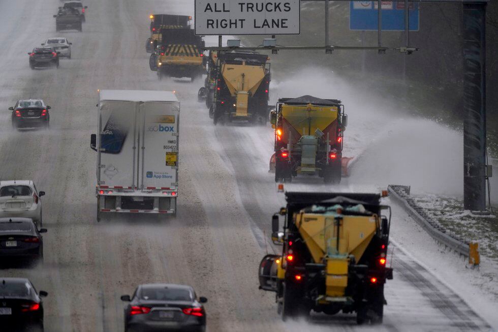 Vehicles navigate hazardous driving conditions along Interstate 85/40 as a winter storm moves...