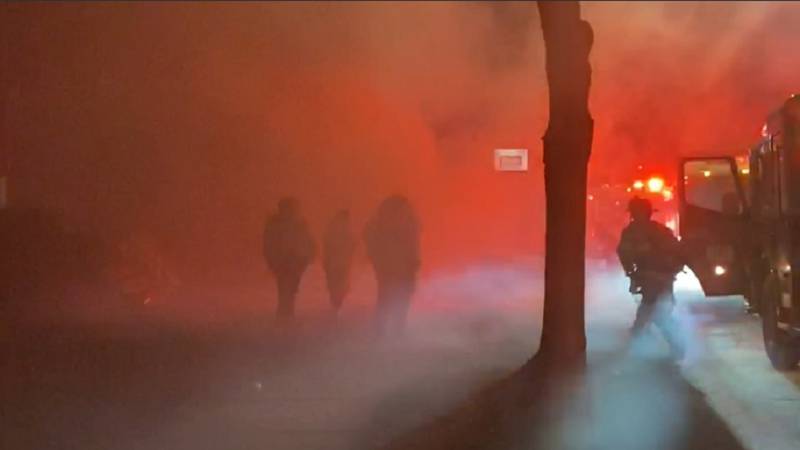 Neighbors and Fort Wayne firefighters rushed to help those in a home that caught fire Friday...