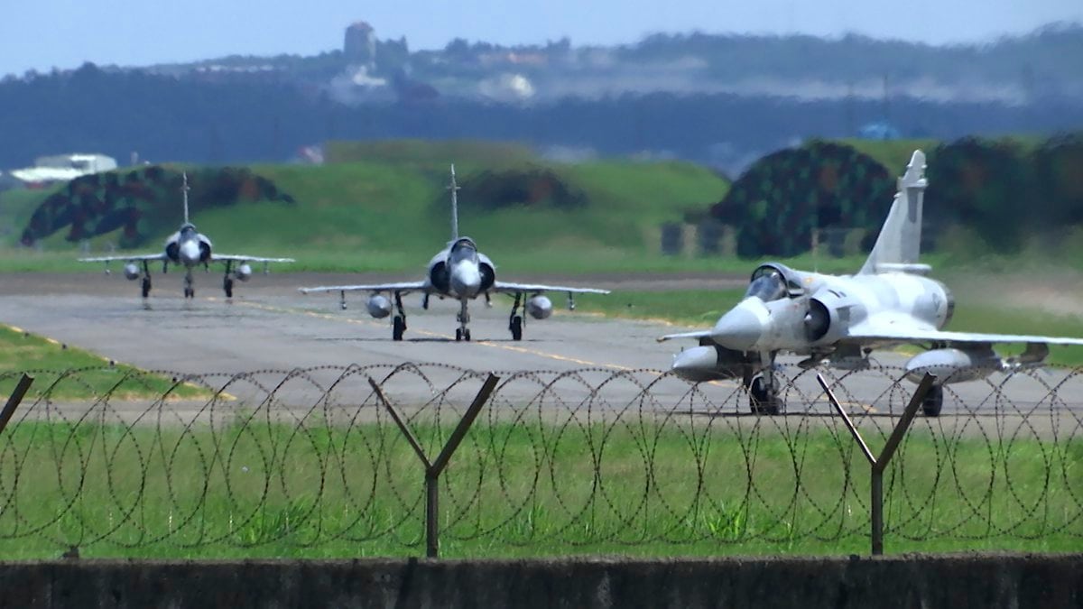 Taiwan Air Force Mirage fighter jets taxi on a runway at an airbase in Hsinchu, Taiwan, Friday,...