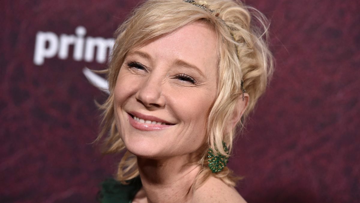 FILE - Anne Heche arrives at the premiere of "The Tender Bar" on Dec. 12, 2021, at the TCL...