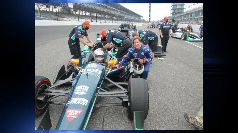 Linda Jackson Rides at Indy with Mario Andretti