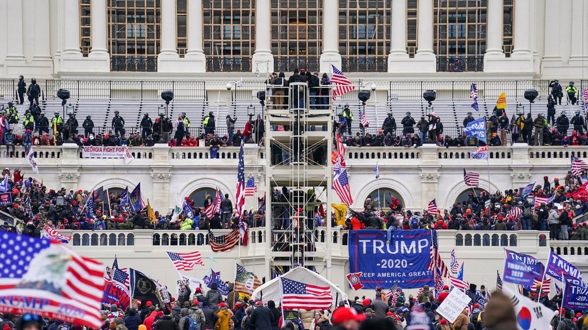 FILE - Insurrectionists loyal to President Donald Trump breach the Capitol in Washington, Jan....