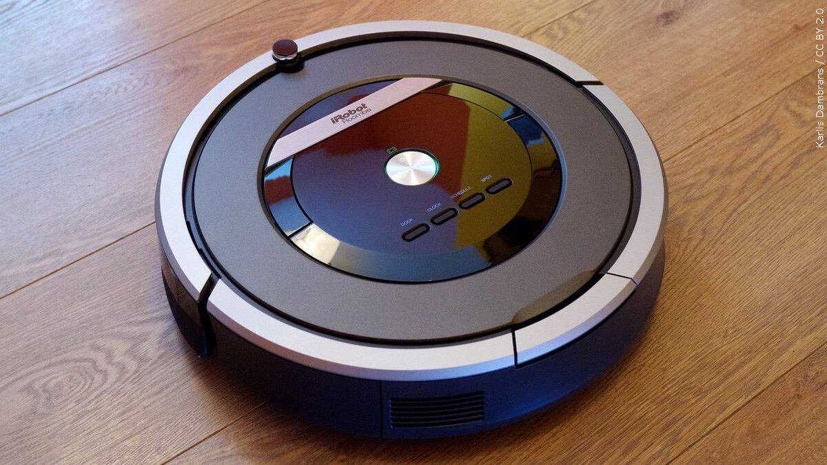 A Roomba vacuum is shown in this photo from May 31, 2014. The company that make Roombas,...
