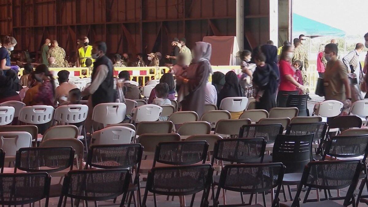 Hundreds of refugees are being processed at Camp Atterbury south of Indianapolis.