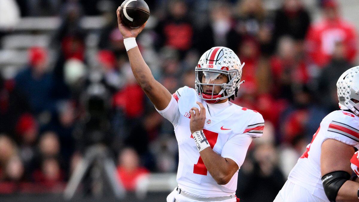 Ohio State quarterback C.J. Stroud (7) passes during the first half of an NCAA college football...