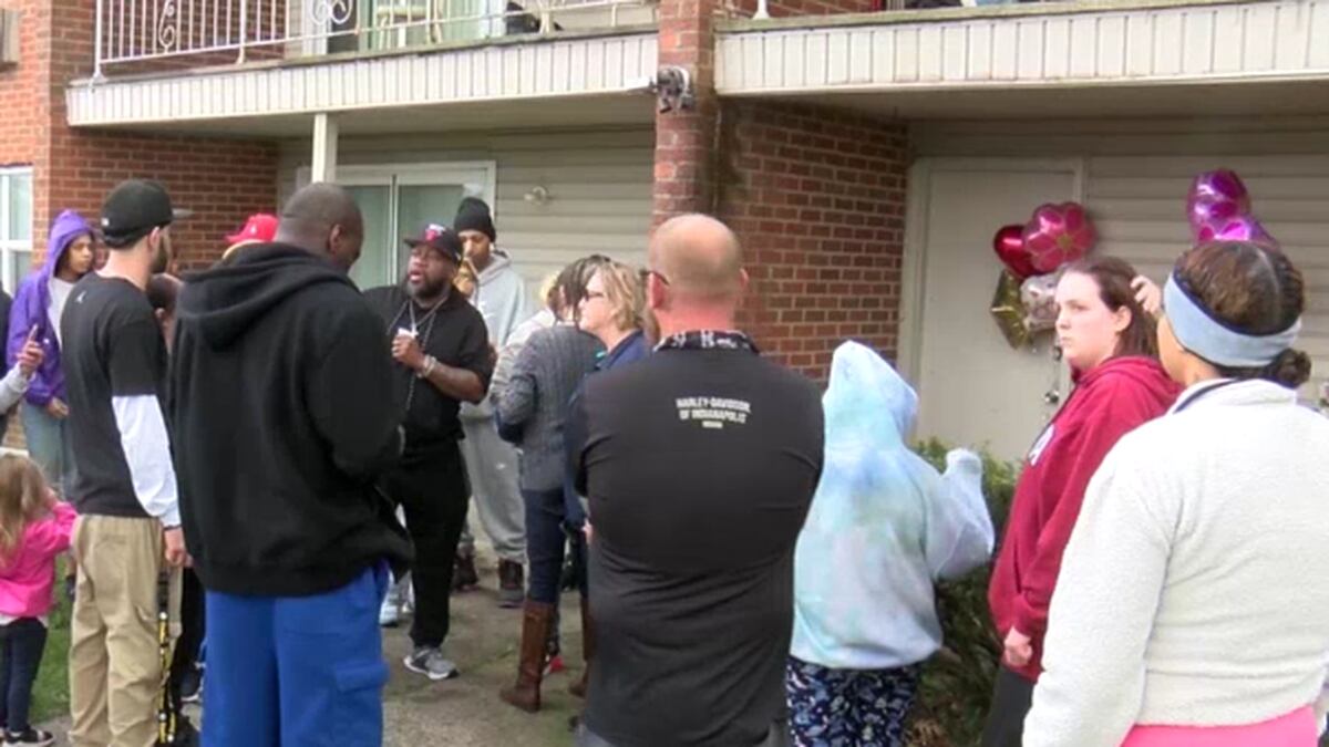 Community gathers for vigil for woman killed in murder-suicide