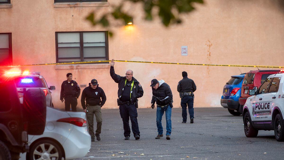 New Mexico State Police assists APD officers in investigating a deadly overnight shooting at...