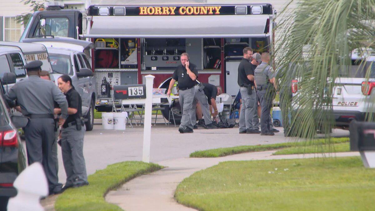 A heavy police and fire presence along Centennial Circle in the Carolina Forest area after a...