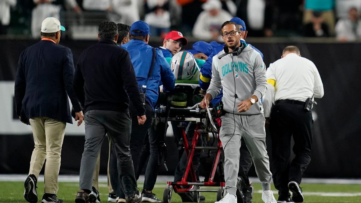 Miami Dolphins quarterback Tua Tagovailoa is taken off the field on a stretcher during the...